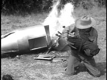 Eben Kent retrieving the baby Kal-El from the burning rocket